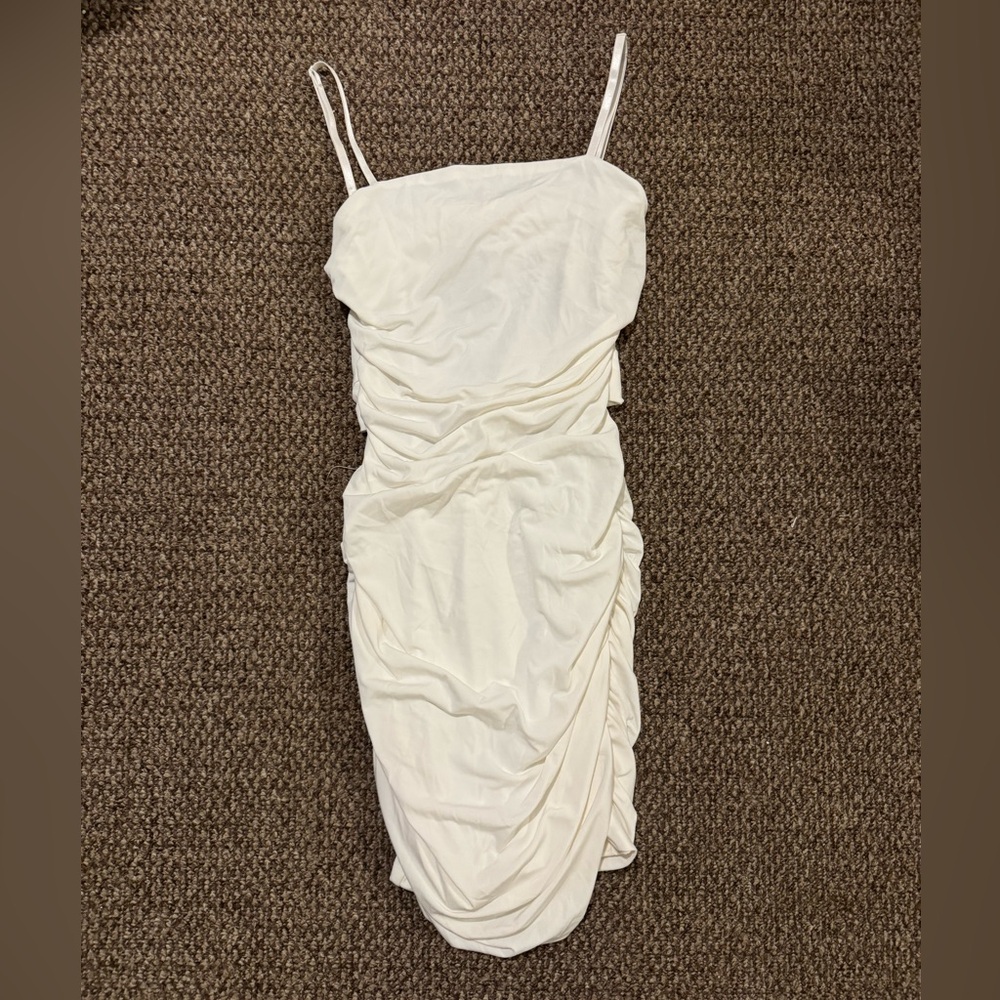 Formal dress, tight with ruffles,looks weird until it is on,very beautiful dress